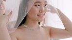 Bride, dress and happy before wedding with woman, bridesmaid and together in home. Girl, friends and support with gown in bedroom, ready for marriage ceremony, celebration or party in Seoul, Korea 