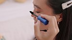 Cosmetics, eyelash and makeup of a woman doing mascara for beauty with brush or wand for event in a room. Closeup of beautiful asian female face preparing eyelashes in luxury cosmetic eye treatment