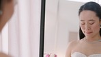 Anxiety, wedding and stress with bride looking nervous and breathing in a mirror, anxious and afraid. Thinking, mistake and panic by asian woman control panic attack while getting ready for ceremony