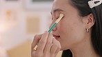 Makeup artist woman with eyeshadow brush working on friends or client face for cosmetics, beauty or skincare. Creative professional entrepreneur with color powder product on asian or Japanese model