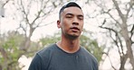 Man doing warm up, stretching and running in the morning at a park. Young mixed race male doing a pre workout stretch, jumping and getting heart rate up and muscles loose. Fitness, runner and health
