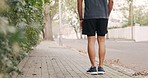 City stretching, legs training and man running for cardio workout, motivation for strong body and health wellness. Back of runner doing fitness exercise for performance in a marathon competition