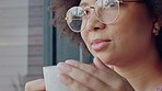 Black woman afro, coffee and smile with glasses looking out of window at home or apartment. Closeup of happy African female freelancer face smiling while enjoying a warm beverage and thinking inside