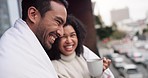 Happy, love and marriage couple with coffee, conversation and laugh on a balcony at a hotel with a blanket. Husband and wife talking, affection and enjoying feeling carefree in the morning in a city
