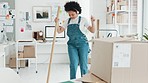 Cleaning, house and black woman, dancing, singing with music in headphones. Girl, afro and dance in apartment, clean home, office or study while streaming song or radio in flat or room after moving