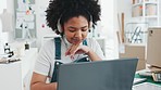 Black woman, laptop and notebook to study in office, home or studio to design. Woman, music and listening on headphones while learning online, with computer or pc at desk, in house or workplace