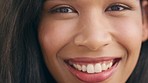 Portrait of face, smile and beauty of a Brazilian woman with perfect teeth for dental health model smiling and glowing with happiness. Closeup zoom of female with beautiful skin and positive attitude