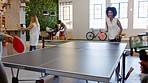 Table tennis, phone and video with a woman employee and her colleague playing a game and having fun in their office breakroom. Team building, motivation and competition in an office for design
