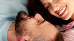 Love, relax and kiss on bed couple enjoy intimate and happy leisure in Brazil home in the morning. Man and woman in romantic relationship smile with joy with resting embrace together in bedroom.