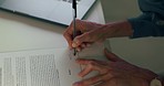 Zoom of lawyer hands sign legal divorce documents, contract and paper deal in office with client. Financial advisor in meeting with partnership, company sale or employee startup compliance agreement 