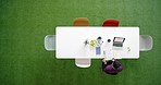 Marketing worker with paper, report and check emails online a laptop in a creative office at work. Advertising man with online research with document, coffee and finance proposal at table from above