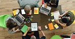 Planning, startup teamwork or collaboration of above meeting working with technology in design office in studio. Creative, finance or team building for kpi document, marketing or advertising review