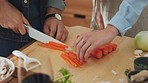 Healthy, carrot and diet couple eating cooking and eating vegetable for vegan lifestyle in kitchen together. Young nutritionist chef people making lunch with food for vitamin for vitamin c wellness