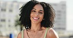 Happy black woman, smile and laugh in city outdoors in summer on vacation, travel or holiday trip alone. Portrait of young relax gen z girl, afro hair and beauty happiness freedom trip in urban town