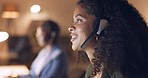 Call center, night and black woman consulting with people online in a dark office. Face of an African customer service worker talking, working and giving support with a headset during overtime