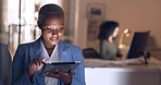 Business, night and black woman working on tablet in corporate office. Technology, internet and businesswoman doing overtime at work, busy with deadline. Online, tech and girl using digital notebook