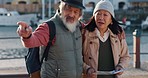 Senior couple, travel and map directions on vacation, holiday or summer trip in Italy. Retirement, elderly and Asian man and woman, tourists spending quality time together and outdoors in city street