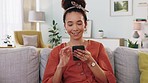 Relax, phone and woman on a sofa texting and browsing the internet in a living room. Portrait, smile and zoom in on face of black woman happy with subscription and streaming service in her home