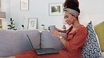 Relax, laptop and coffee with woman in living room and search for social media news, communication or watching movie. Internet, contact and networking with freelancer working online for sofa at home 