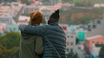 Friends, city and handshake with a black man and happy friend outside in a town, hugging while looking at the view. Urban, travel and sightseeing with a young male on vacation with a companion