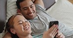 Asian couple, phone and bonding while laughing at internet news, social media meme and funny communication in home or house bedroom. Smile, happy and comic man and woman with mobile technology on bed