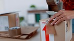 Packaging, delivery box and hands for fashion, product and courier service in e commerce, logistics or supply chain industry. Cardboard boxes, production process and stock distribution workspace desk