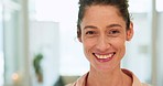 Face, happy and smile with a business woman next to mockup while standing alone in her office at work. Portrait, vision and success with a female employee feeling proud in a professional workplace