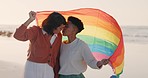 lesbian women kiss at beach, people love with gay pride flag summer and queer freedom in Miami. Gen z lgbtq couple hug by ocean, travel together on holiday and happy woman partner in sunset date