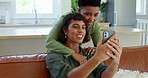 Lesbian couple, phone or video call on sofa in house, home or holiday hotel in communication, live streaming or social media. Smile, happy or hugging lgbtq women lockdown bonding on mobile technology