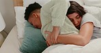 Fighting, sorry and apology with a clingy girlfriend hugging her partner while lying in bed together. Couple, bedroom conflict with an angry lgbt female feeling unhappy with her wife at home