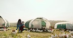 Chicken, countryside farm and family walk together on agriculture grass, bond and enjoy fun quality time. Sustainability poultry farming, animal livestock bird and farmer parents with child on field