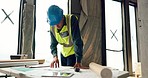 Man, architect and planning for inspection, construction or maintenance in safety and security on site. Male engineer, builder or contractor checking project plans for industrial architecture at work