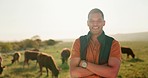 Portrait, farm and cattle farmer man alone working outdoor on grass field or land. Arms crossed, agriculture or livestock farming male, worker or business owner from Canada happy with cows or animals