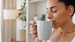 Cup of coffee, smell and happy woman with a smile enjoying her morning drink while relaxing at home. Happiness, calm and girl from Mexico drinking a warm beverage while resting in her modern house.