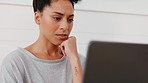 Laptop, confused and thinking with a black woman entrepreneur remote working from home in her small business. Computer, doubt and idea with a female employee problem solving at work in the office