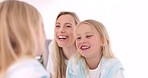 Happy, funny faces and mother with a child looking in the mirror while making a comic joke. Happiness, smile and young mom having comedy fun with her daughter at their family home in Australia.