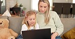 Laptop, e learning and mother with child on sofa for online education, website or internet teaching application. Family lounge, mother with girl kid and pc technology for internet kindergarten games