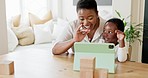 Video call, mother and child talking on a tablet for communication together in their house. Education, learning and kid greeting with wave in conversation and discussion with technology in their home