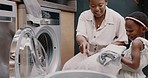 Mom, child smile and do laundry together with digital washing machine technology for clean, fresh smelling clothing and fast work. Happy black mother, girl does housework and learning household chore