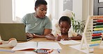 Black woman, laptop and help child with homework, while typing work and proposal for business. Mama, child and assist kid with color book, typing on digital device and bonding being loving and talk.