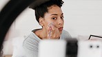 Black woman, influencer and phone video makeup tutorial  with ring light for social media app. Live streaming, smartphone and cosmetic advertising girl testing product for online recording.

