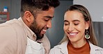 Young couple in kitchen, people cooking in Mexico apartment and comic Indian man joke with girlfriend's smile. Face of happy latino woman talking, bonding on home date and love funny time together