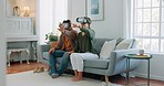 Metaverse, virtual reality headset and couple on sofa in house or home living room for cyber game, 3D gaming or fun futuristic world. Vr gaming, technology or man and woman bonding on future ai media