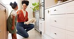 Mother, girl and baking high five in kitchen, teamwork and celebration in home. Love, support and bonding mom and girl put tray in oven, cooking or collaboration, success or working together in house