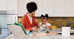 Mother, child and learning for baking with flour helping in the kitchen with recipe or ingredients at home. Happy mom teaching helpful kid to bake or mix together with smile for family bonding time