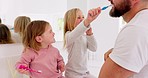 Girl children, father and brushing teeth for bonding and being happy for bathroom, playful and laugh together. Growth, child development and dad teach female kids oral hygiene, healthcare and dental.