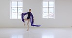 Ballet, woman ballerina and dance in studio while training for performance, dancing school or academy. Dancing, art and  dancer, fitness and creative activity with silk scarf, practice and grace.