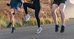 People exercise on road, high knee in fitness workout or sports coach outdoor California mountain. Training legs in group, strong energy and jumping cardio action or teamwork movement together