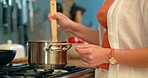 Steel pot, kitchen and cooking of woman hands with steam for dinner, food or culinary experiment on stove with zoom. Closeup a chef or home person prepare soup for healthy supper on a gas stove