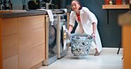 Washing machine, laundry and woman cleaning clothes, fabric and housekeeping with basket for fresh home. Young girl loading clothing, linen and dryer with electrical appliance for routine life tasks 